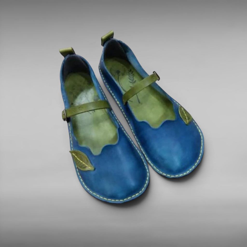ZOFIA ATELIER blue ethnic single sandals with green leaf accents and buckle strap. Round toe, artificial PU.