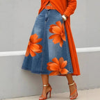 ZOFIA ATELIER blue denim-style midi skirt with large orange floral print, A-line fit, polyester