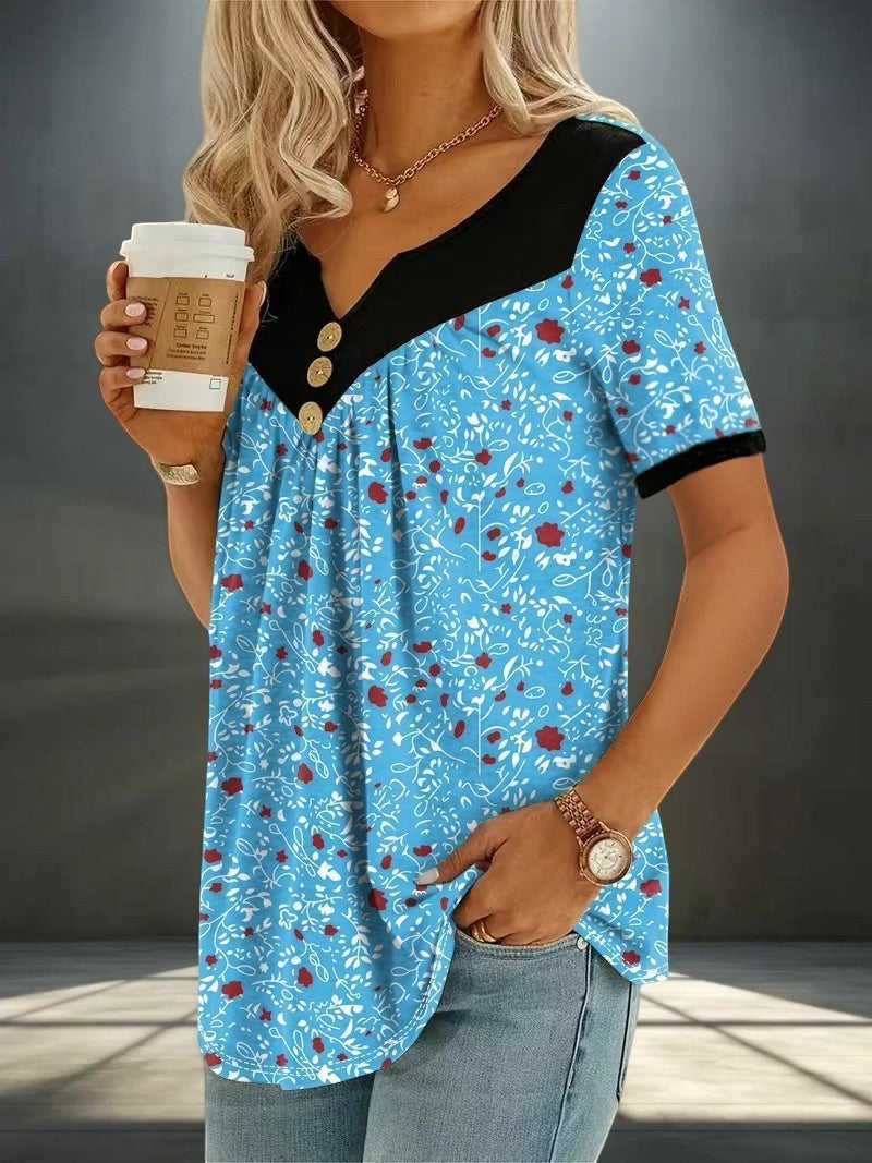 ZOFIA ATELIER blue floral print short sleeve v-neck top with button detail and black contrast yoke.