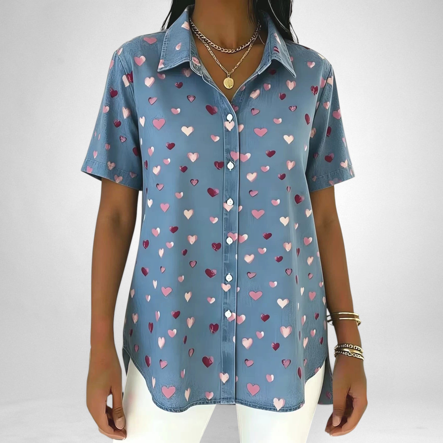 ZOFIA ATELIER blue short-sleeved polyester top with all-over pink and red heart print. Loose fit.