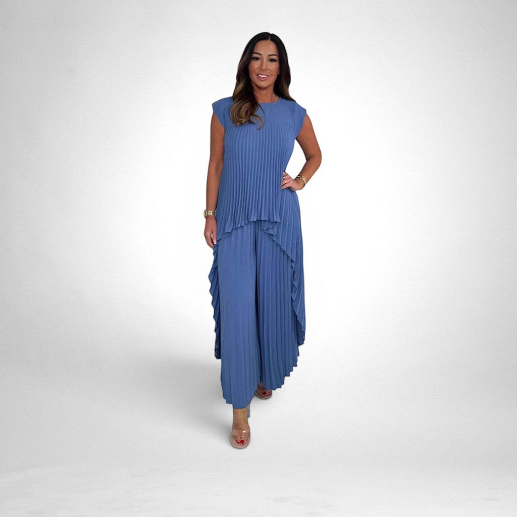 ZOFIA ATELIER blue pleated short sleeve suit with wide leg pants and flowing silhouette, made of polyester.
