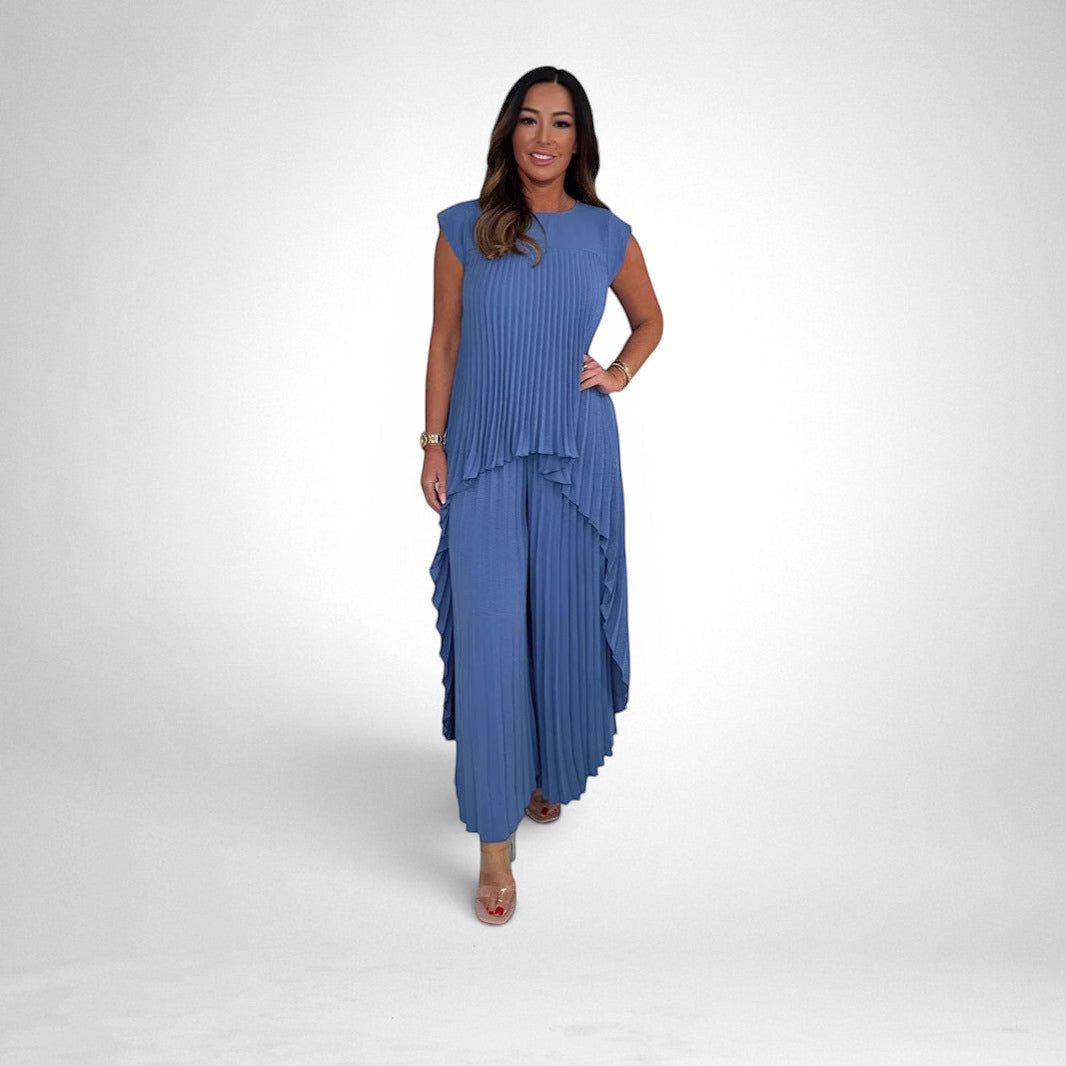ZOFIA ATELIER blue pleated short sleeve suit with wide leg pants and flowing silhouette, made of polyester.