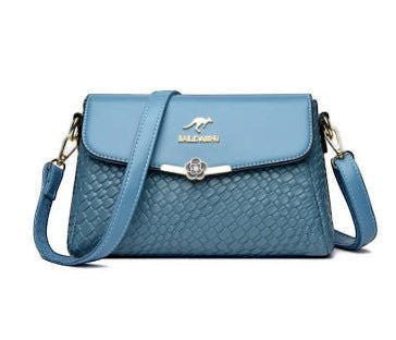 ZOFIA ATELIER blue PU leather crossbody bag with rhombus pattern and silver flower clasp. Medium hardness, lined interior.