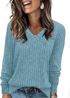 ZOFIA ATELIER light blue ribbed V-neck long sleeve t-shirt with a subtle vertical stripe pattern.