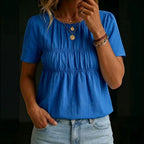 ZOFIA ATELIER blue cotton-linen blend short-sleeve crew-neck top with smocked bodice and loose fit.