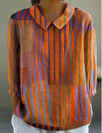 ZOFIA ATELIER blusa de manga 3/4 com padrão de riscas verticais em laranja, azul e cinzento, colarinho Peter Pan.