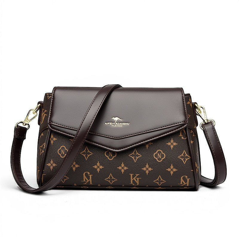 ZOFIA ATELIER bolsa tiracolo retangular em PU castanho com padrão de monograma e fecho de aba.