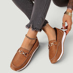 ZOFIA ATELIER brown faux leather chain platform loafers with white stitching and gold hardware.