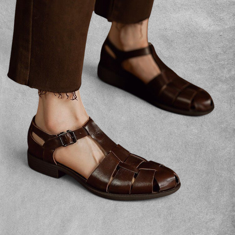 ZOFIA ATELIER brown genuine leather retro Roman sandals with woven straps and buckle closure.