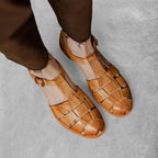 ZOFIA ATELIER brown genuine leather retro Roman sandals with woven straps and buckle closure.