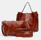 ZOFIA ATELIER brown PU leather 4-piece bag set with medium bucket tote, crossbody bag, zipper pouch, and cardholder.