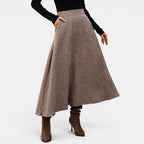 ZOFIA ATELIER brown A-line wool blend midi skirt with pockets and a flattering drape.