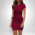 ZOFIA ATELIER short sleeve burgundy cotton blend dress with a tie waist and pleated skirt.