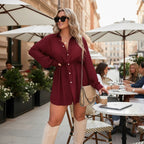 ZOFIA ATELIER burgundy spandex button-front shirt jumpsuit with lace-up waist detail and long sleeves.