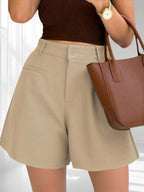 ZOFIA ATELIER calças de ganga bege de cintura subida, perna reta, em poliéster com ligeiro stretch e bolsos.