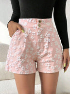 ZOFIA ATELIER shorts cor-de-rosa com padrão floral em relevo branco, cintura subida e botões dourados.