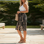 ZOFIA ATELIER black capri pants with abstract beige print, loose fit, mid-rise waist, bamboo-strip linen fabric.