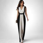 ZOFIA ATELIER Carmen black and white pleated wide-leg jumpsuit with V-neckline and sleeveless design.