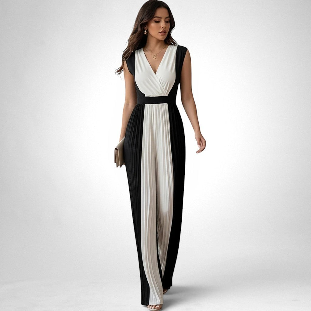 ZOFIA ATELIER Carmen black and white pleated wide-leg jumpsuit with V-neckline and sleeveless design.