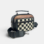 ZOFIA ATELIER black and cream chessboard crossbody handbag with PU leather accents and adjustable strap.