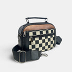 ZOFIA ATELIER black and brown PU leather handbag with a black and white chessboard pattern front panel and adjustable strap.