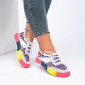 ZOFIA ATELIER white mesh sneakers with red and blue floral pattern and rainbow gradient sole.