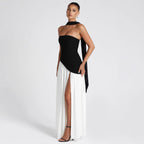 ZOFIA ATELIER black and white color block tube dress with off-the-shoulder neckline and high slit, made of polyester.