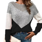 ZOFIA ATELIER grey, white, and black colorblock knit sweater with a V-neck detail and long sleeves.