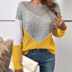 ZOFIA ATELIER grey, white, and yellow colorblock crew neck sweater with open knit detail on shoulders. Viscose fiber.