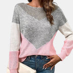 ZOFIA ATELIER pink, grey, and white colorblock crew neck sweater with a V-shaped open knit detail.