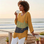 ZOFIA ATELIER colorblock V-neck top in mustard yellow, olive green, and charcoal grey with zigzag stitching detail.