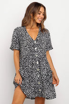 ZOFIA ATELIER black and white dalmatian dot print mini dress with V-neck and loose waist.