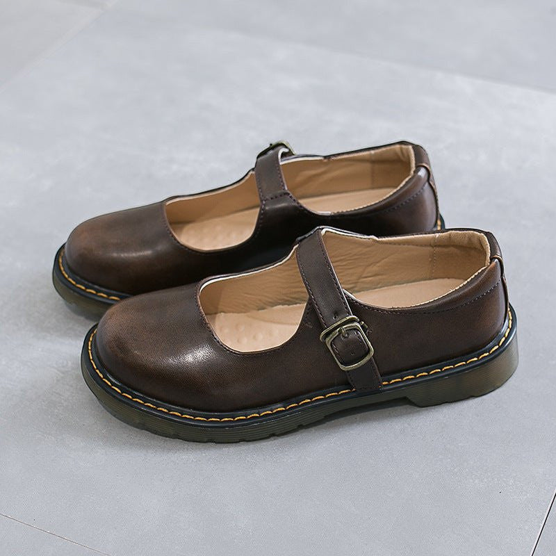 ZOFIA ATELIER dark brown microfiber low-cut flat shoes with buckle closure and rubber sole.