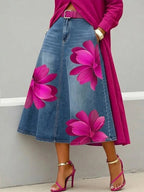 ZOFIA ATELIER blue denim-style midi skirt with large pink floral print, A-line fit, polyester