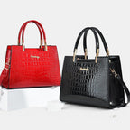 ZOFIA ATELIER Dominika bolsa de ombro em PU com acabamento em patente, disponível em preto e vermelho.