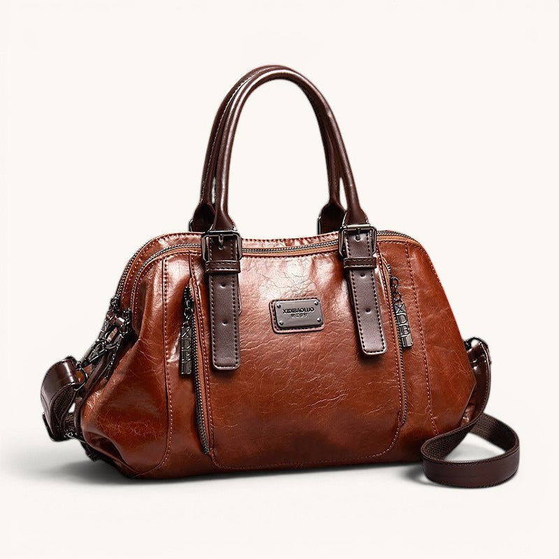 ZOFIA ATELIER Dominika medium retro brown soft leather messenger bag with adjustable strap and zipper closure.
