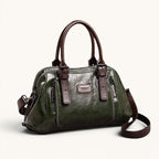 ZOFIA ATELIER Dominika olive green soft leather messenger bag with adjustable strap and zipper closure.
