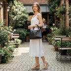ZOFIA ATELIER Dominika patent shoulder bag in black PU with crocodile texture, medium-hard structure, and gold hardware.