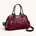 ZOFIA ATELIER Dominika medium red polyester fiber Boston messenger bag with adjustable strap and zipper closure.