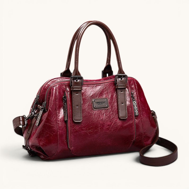 ZOFIA ATELIER Dominika medium red polyester fiber Boston messenger bag with adjustable strap and zipper closure.