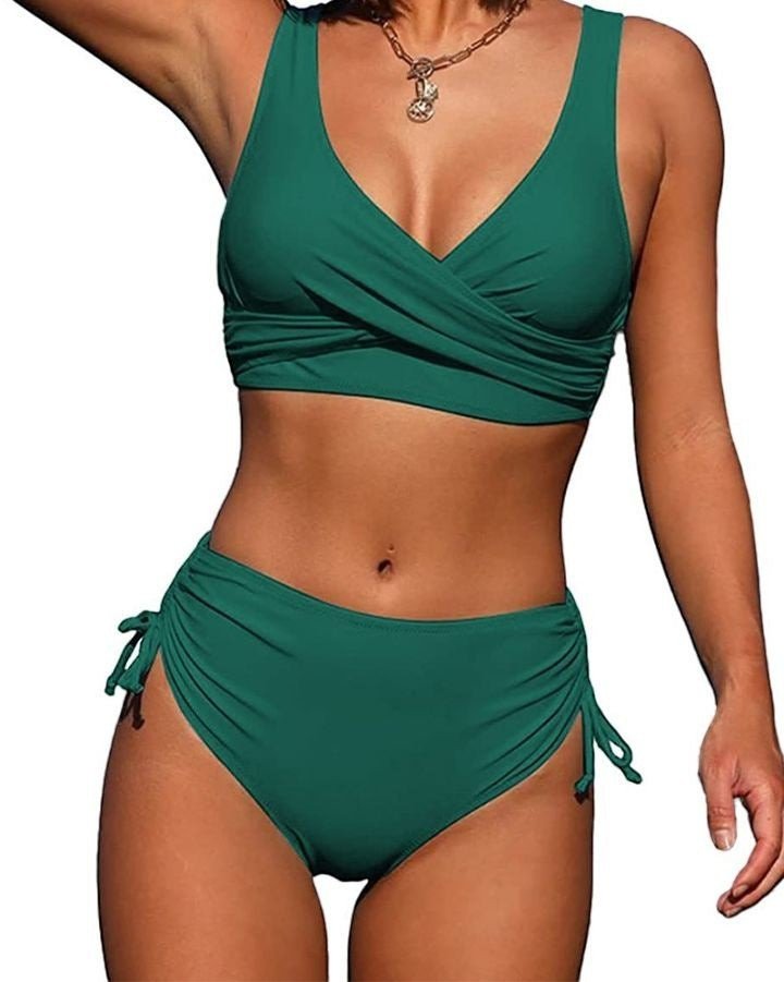 ZOFIA ATELIER Sylwia strappy emerald green bikini with ruched high-waisted bottoms and tie details.