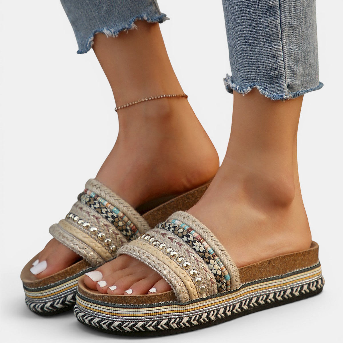 ZOFIA ATELIER Urszula exotic platform slide sandals with woven straps, beads, and colorful geometric pattern. Round toe, cork sole.