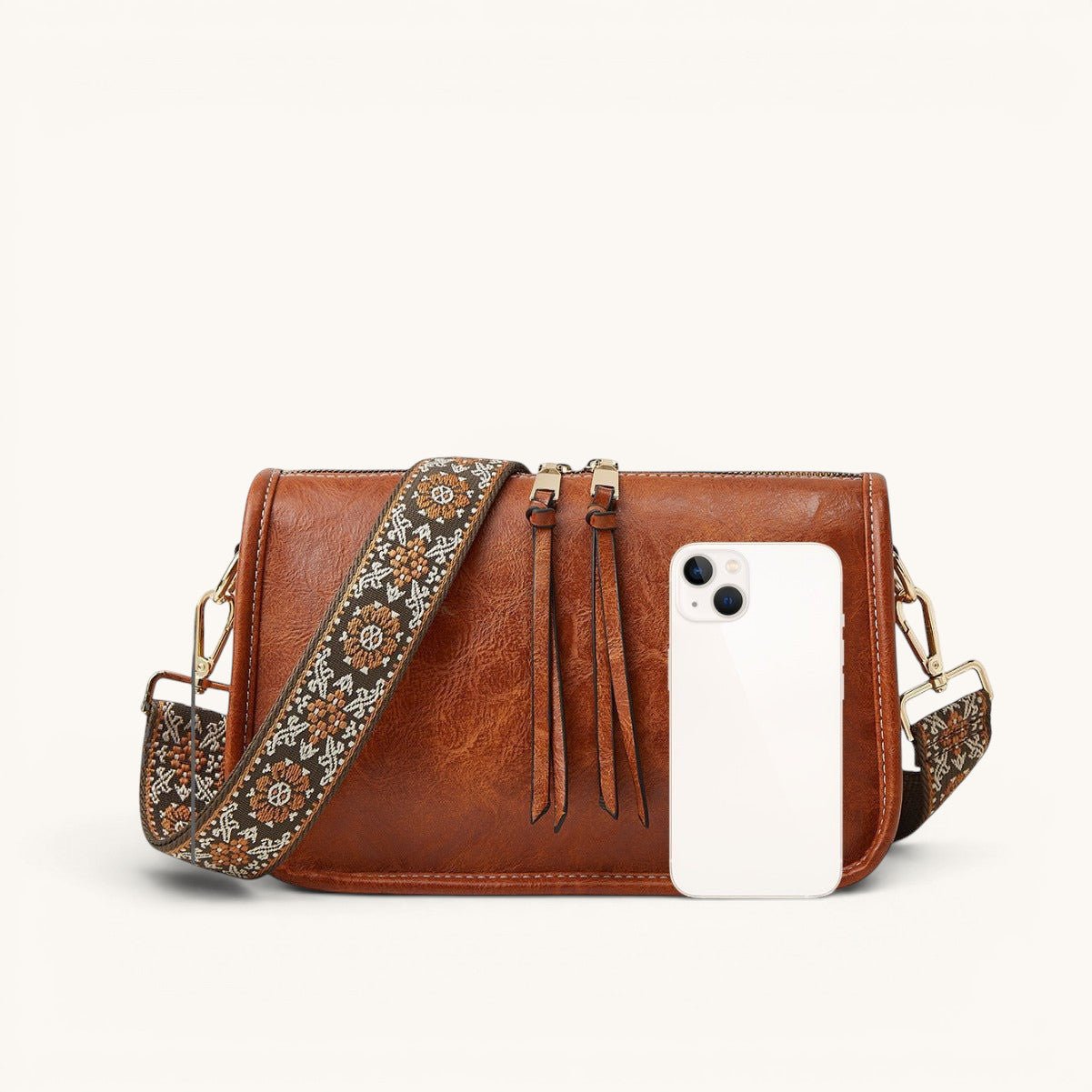 ZOFIA ATELIER FELICJA tote bag in brown PU leather with a decorative embroidered strap and tassel details.
