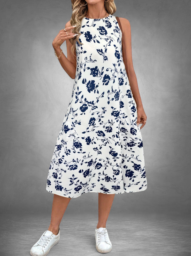 ZOFIA ATELIER sleeveless white polyester midi dress with navy floral print and relaxed fit.
