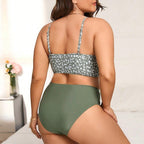 ZOFIA ATELIER floral print green swimsuit with high-waisted bottoms and adjustable straps.
