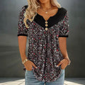 ZOFIA ATELIER black floral print v-neck short sleeve top with button detail and flowy fit.