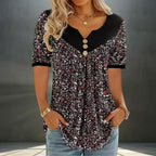 ZOFIA ATELIER black floral print v-neck short sleeve top with button detail and flowy fit.