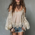 ZOFIA ATELIER GABRIELA off-the-shoulder blouse in beige lace with ruffle details and puff sleeves.