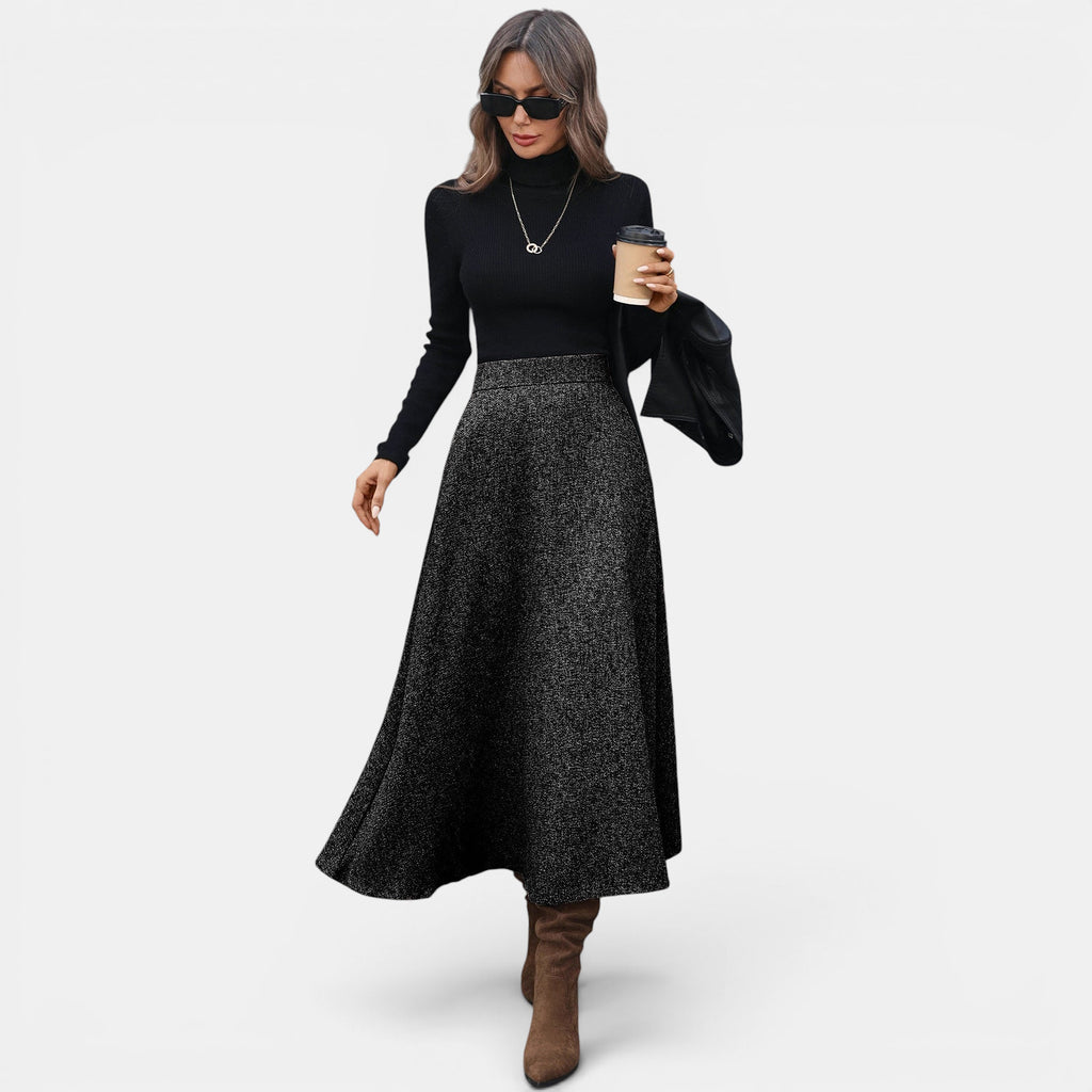 ZOFIA ATELIER GABRIELA draped wool A-line skirt in black with a textured finish, mid-length.