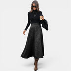 ZOFIA ATELIER GABRIELA draped wool A-line skirt in black with a textured finish, mid-length.